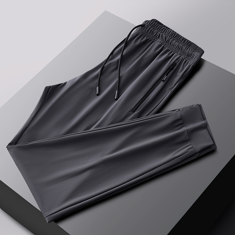 2025 verano pantalones deportivos de talla grande pantalones de hombre pantalones de aire acondicionado pantalones de seda de hielo de secado rápido pantalones de pierna recta gorda al por mayor