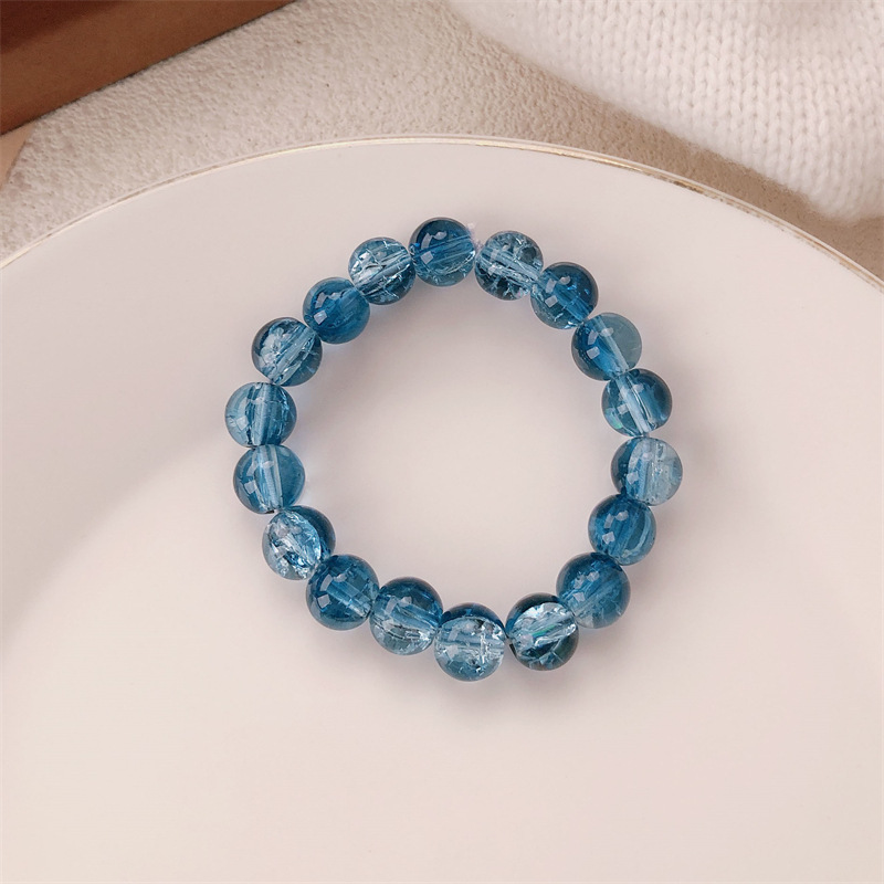 Pulsera de cuentas degradadas de hielo de estilo explosivo Mori alrededor de los dedos