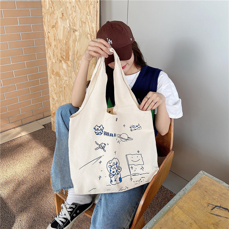 【 In Stock 】13173 Cute Moon Landing Cow single-shoulder Bag, student girls' schoolbag, canvas bag, large capacity wholesale undefined