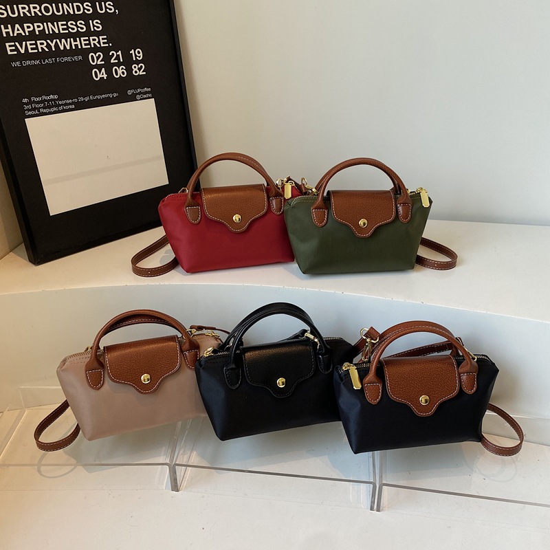 法式小众高级感饺子包包女新款简约轻便零钱手机包时尚单肩斜挎包