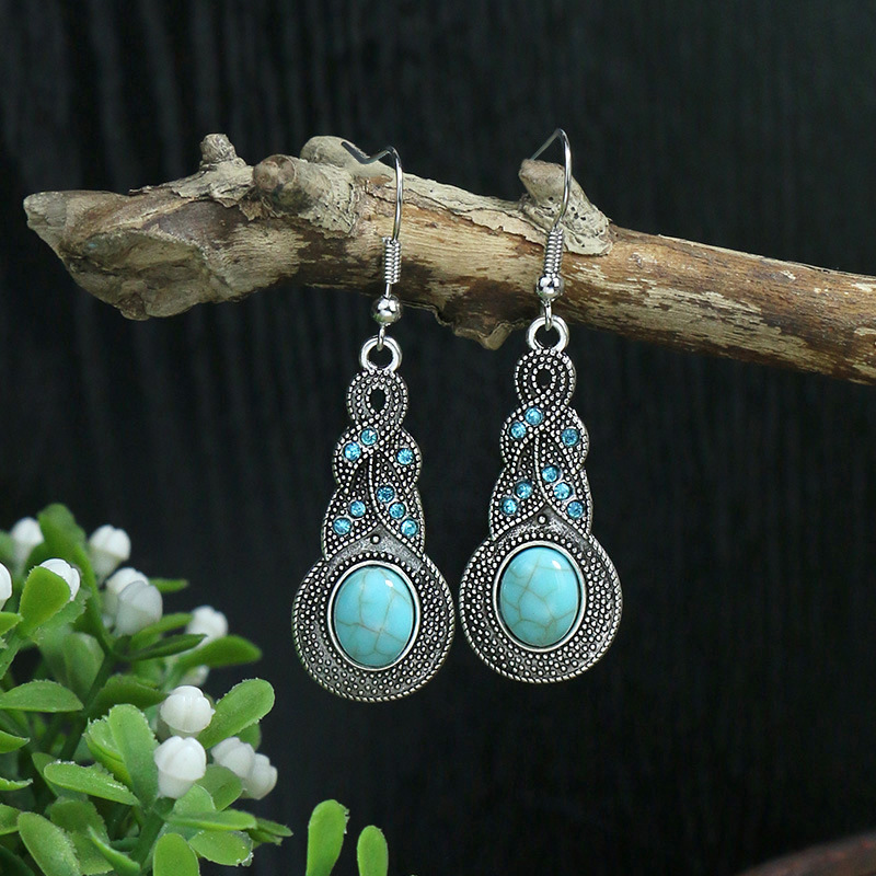Wholesale Jewelry Bohemian Round Water Droplets Arylic Turquoise Tassel Hollow Out Inlay Drop Earrings display picture 2