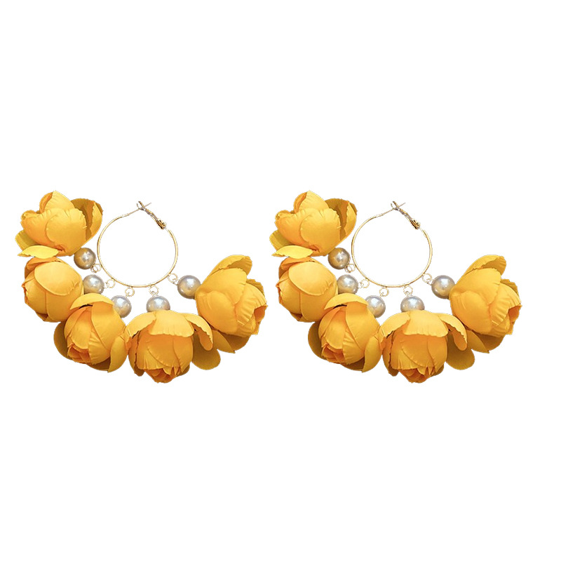 Pendientes de borla de flor de tela de aguja de plata Pendientes de estilo bohemio súper hada femenina Pendientes de moda femenina