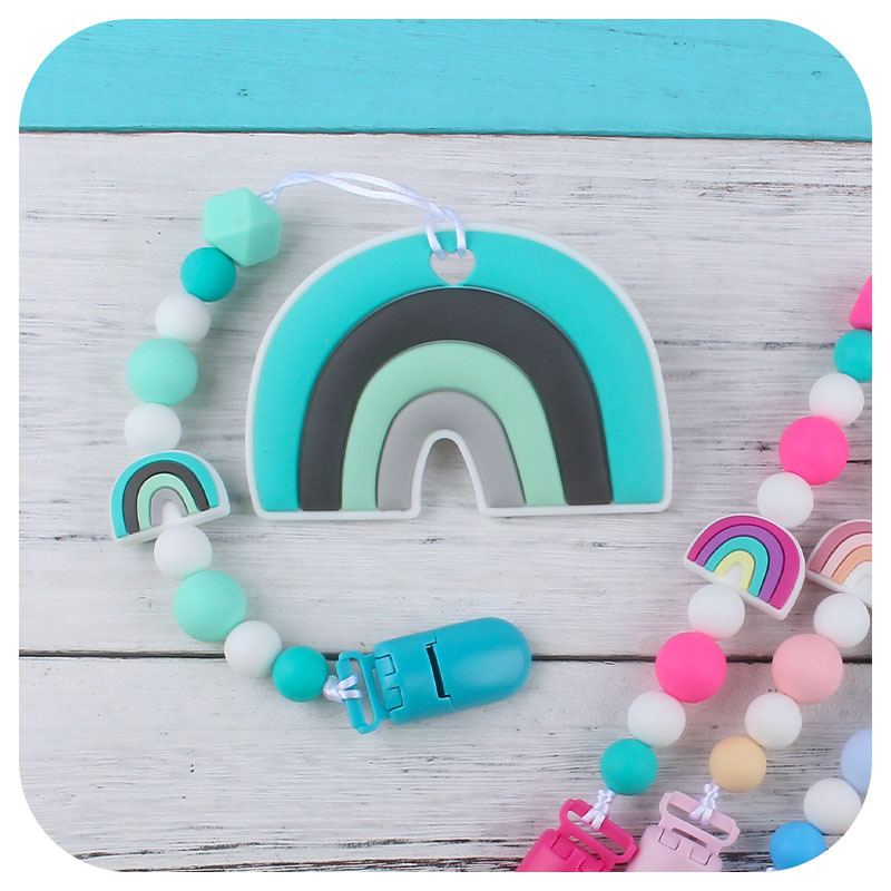 Nuevo bebé dibujos animados colorido rojo silicona teether palo pezón cadena anti-gota cadena juguete teether traje