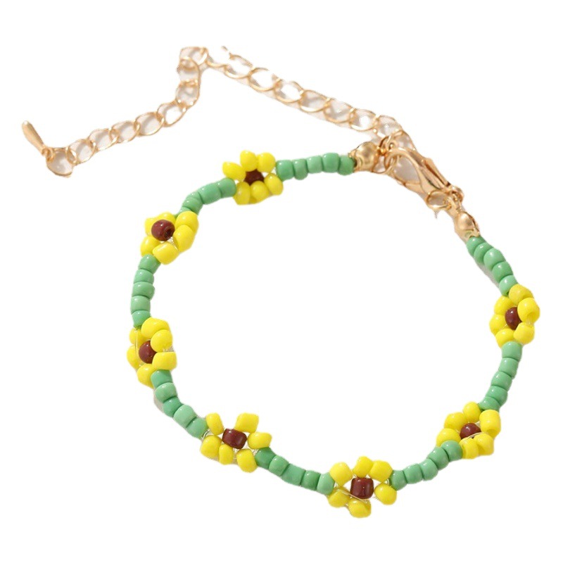 Europea y americana transfronteriza tejida a mano colorida pulsera de cuentas de arroz bohemio playa vacaciones estilo Daisy pulsera para las mujeres