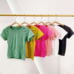 Xiyang Muxue seamless one-piece yoga T-shirt short-sleeved women's quick-drying elastic breathable slimming yoga top