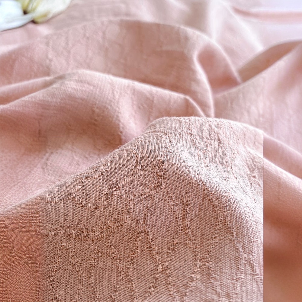 Un juego de cuatro piezas de algodón lavado de algodón de clase 100 hilo de tres capas de algodón puro sábana de lujo simple y ligera cubierta de edredón ropa de cama