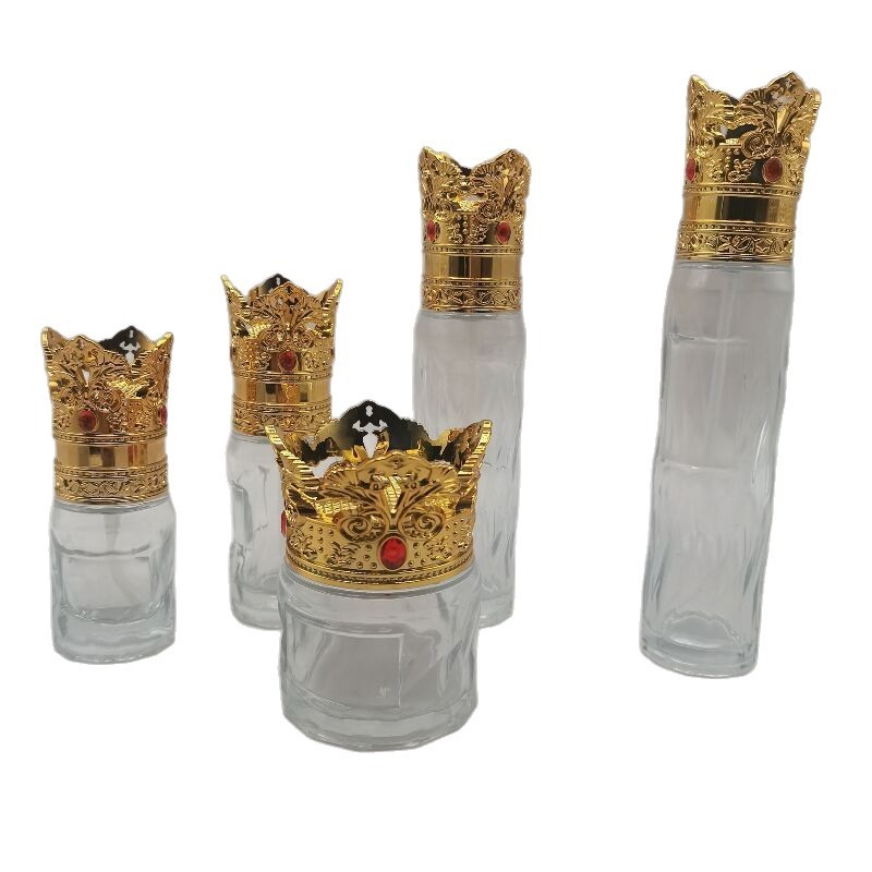 高級精油瓶の空き瓶のバヨネットキャップは蓋の金色のクラウン化粧品の包装瓶の卸売りを強めます。|undefined