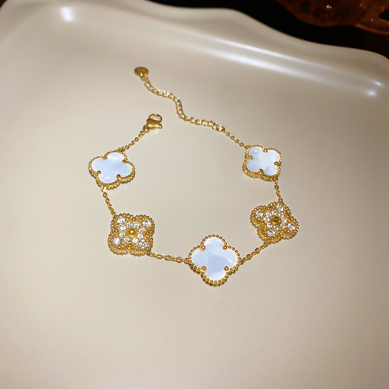本物の金メッキジルコンの貝母の花のブレスレットはシンプルで、手の輪の軽い高級感のある手飾りの女性の卸売りです。|undefined