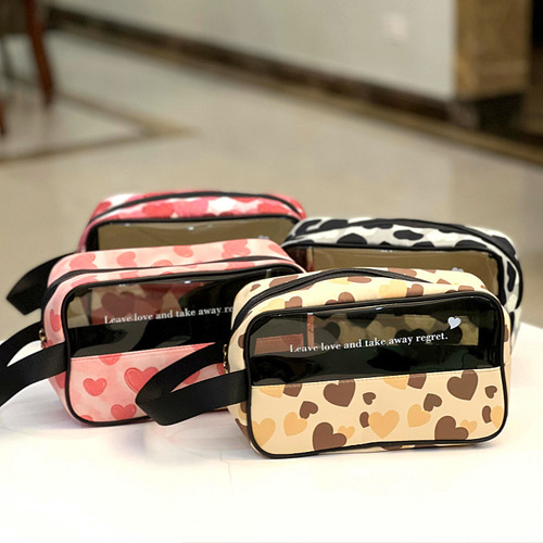 New Korean version of transplanted love translucent portable waterproof cosmetic bag, toiletry bag, portable cosmetic bag, hand bag for women
