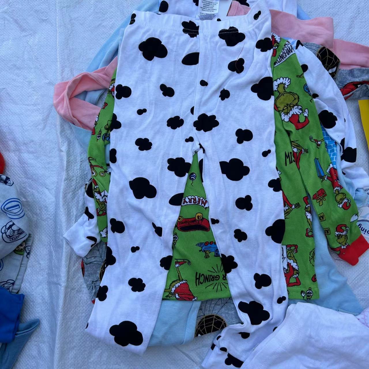 Ropa para niños 23 nuevos niños y niñas pantalones de manga larga ropa de otoño pantalones largos pantalones superiores de algodón de dibujos animados para niños venta de una sola pieza