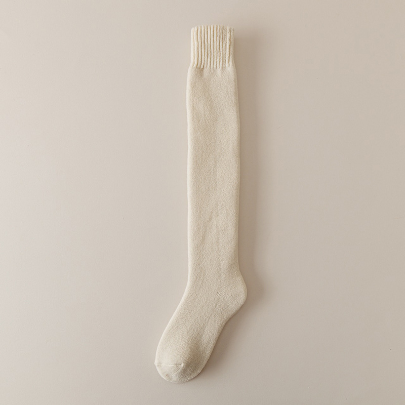 Otoño y invierno calcetines de lana para niños calcetines de pantorrilla gruesas resistentes al frío calcetines gruesas de invierno al por mayor calcetines de rodilla caseros