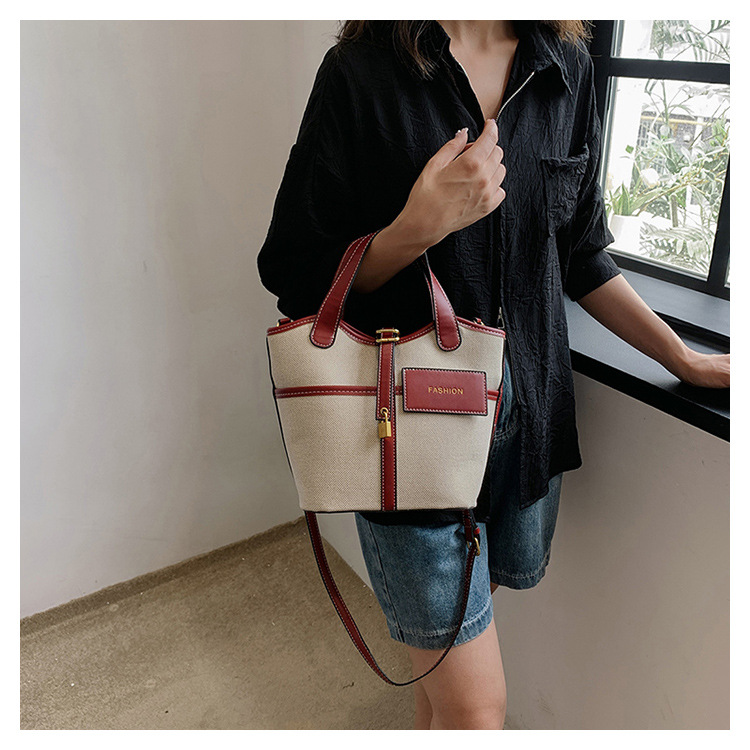 Nicho de diseño retrógrado lienzo portátil bolso de cubo de agua mujer 2026 nuevo cross-border ins canasta de moda bolso de mochila image 10
