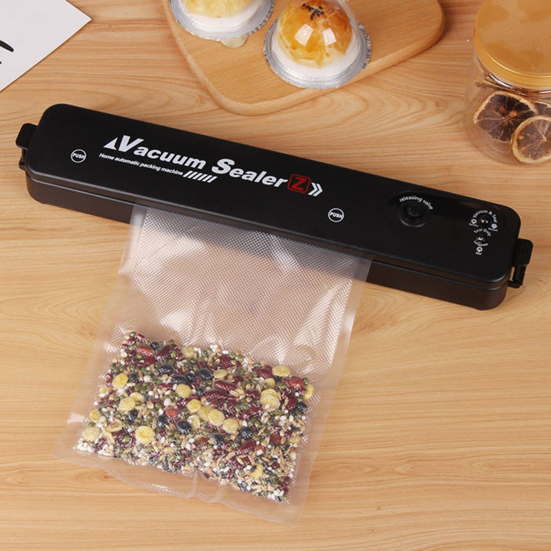 Máquina de envasado al vacío transfronteriza cocina doméstica Mini pequeña máquina de sellado de plástico máquina de mantenimiento fresco máquina automática de sellado al vacío