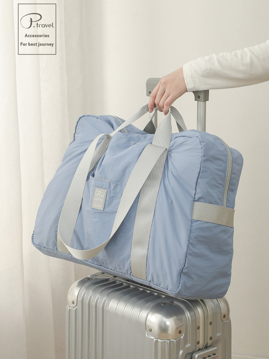 短距離出張旅行バッグ折り畳みバッグ大容量荷物袋折り畳み可能収納バッグ荷物袋タイロッドバッグ