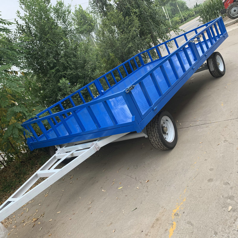 四轮重型短途货物运输车仓库货物协助卸货平板车低栏式牵引车