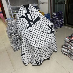 四季型の布を巻いていません。静電気防止ヘアサロンの米家庭用布美容店の新型カットです。