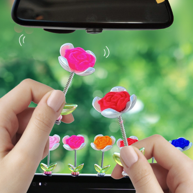 Tendencia nuevo producto flocado rosa coche sacudiendo la cabeza pequeños adornos decoración de primavera tablero accesorios de coche ventana
