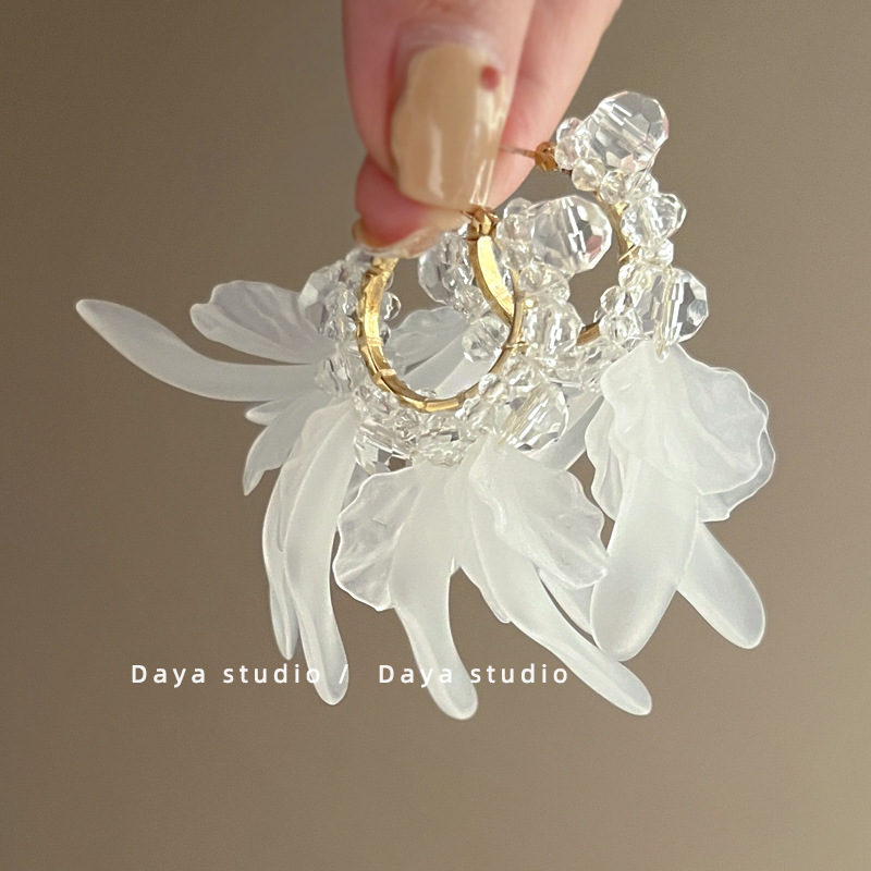 Small design earrings with tassels