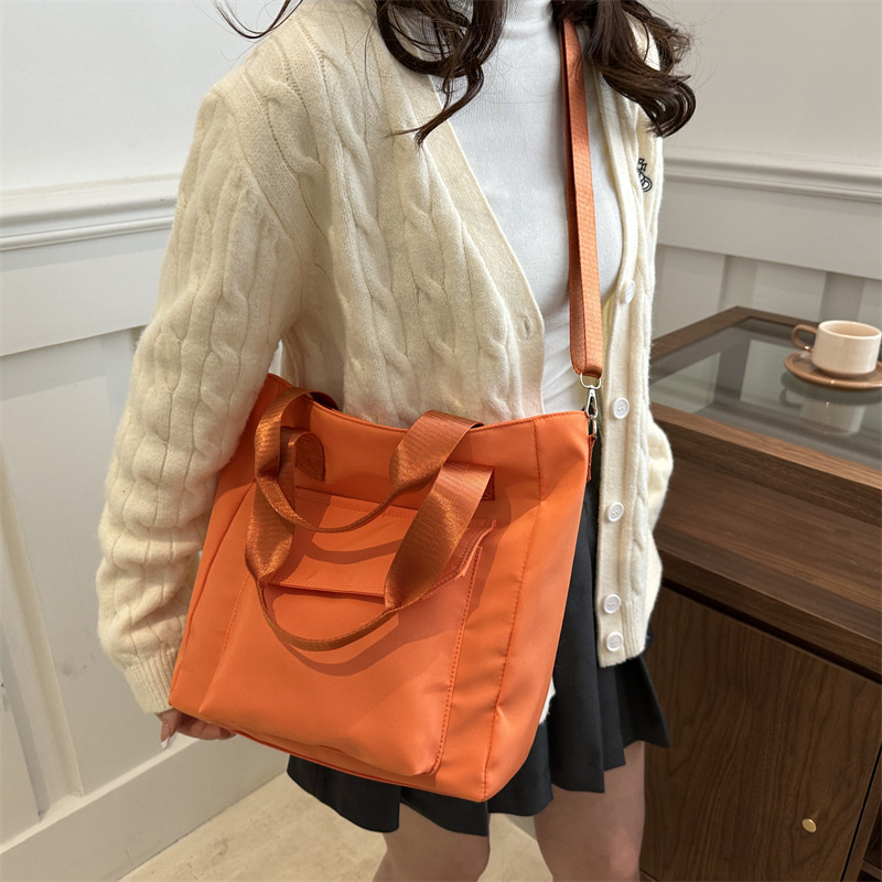 Corea del estilo de transporte universal lona multi-bolsillo TOT estudiantes de arte ocio simple 2025 bolso de hombro portátil