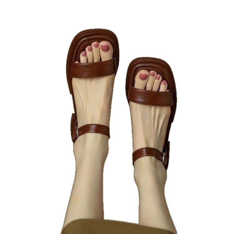 Explosiones cómodas y casuales transpirables con una base suave retro con sandalias para mujeres verano de 2026 nuevas sandalias romanas planas