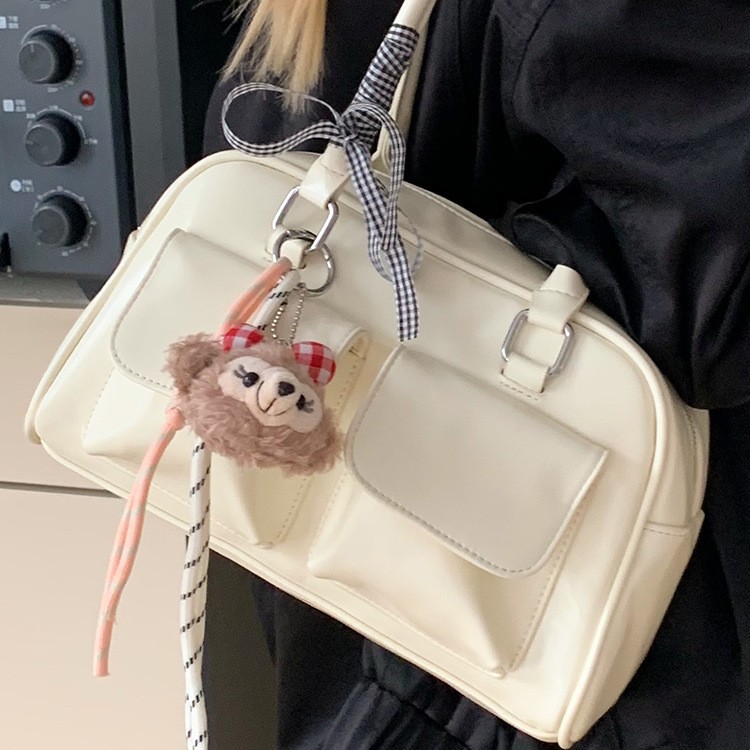 La moda coreana de nicho de estilo extranjero bolsas de palos debajo de las axilas para mujeres 2026 primavera nueva bolsa diaria de Boston bolsas de bolos