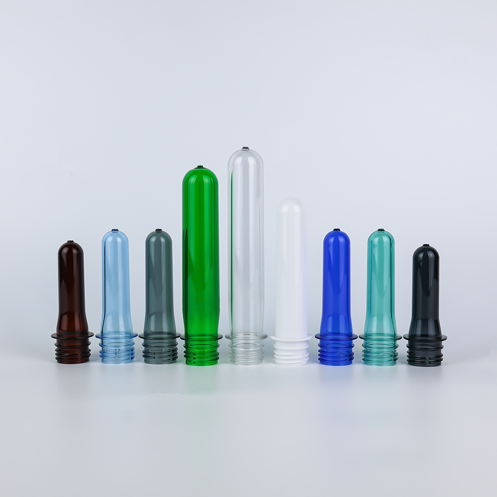 Proveedores al por mayor 28mm / 1810 botellas en blanco de grado alimenticio PET botellas en blanco de bebidas minerales botellas en blanco de nuevo material de producción