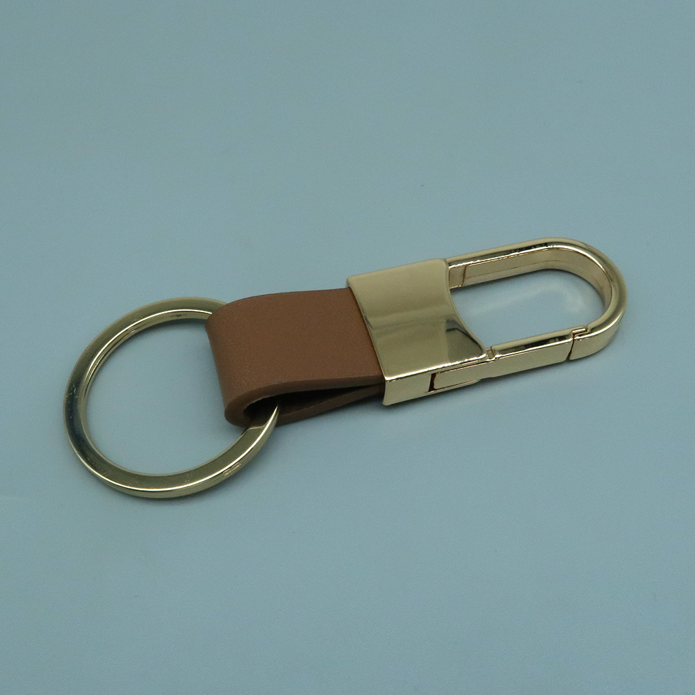 Venta directa de fábrica de llaveros de coche de metal y cuero genuino con logotipo grabado con láser, llaveros creativos. image 25