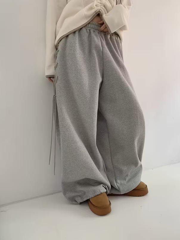 Transfronterizos Europa y América calles laterales correa de horquilla hueca pantalones casuales de mujer otoño y invierno pantalones rectos de piernas largas sueltos