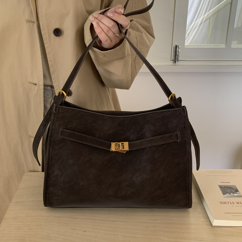 Otoño y invierno bolso de mochila de mujer de gran capacidad 2025 nuevo retro viaje bolsa de mano casual versátil bolso de hombro bajo la axila