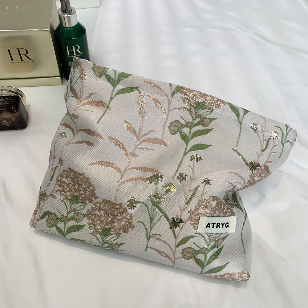 Bolsa de maquillaje, una pequeña bolsa fresca portátil de gran capacidad, bolsa de almacenamiento para productos de cuidado de la piel, bolsa de mano.