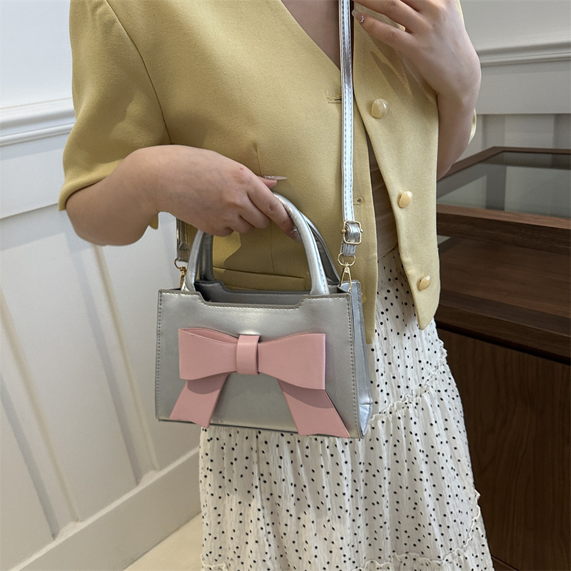 Bolso de moda coreano para mujeres 2024 nuevo arco de viento dulce bolso pequeño nicho bolso de hombro