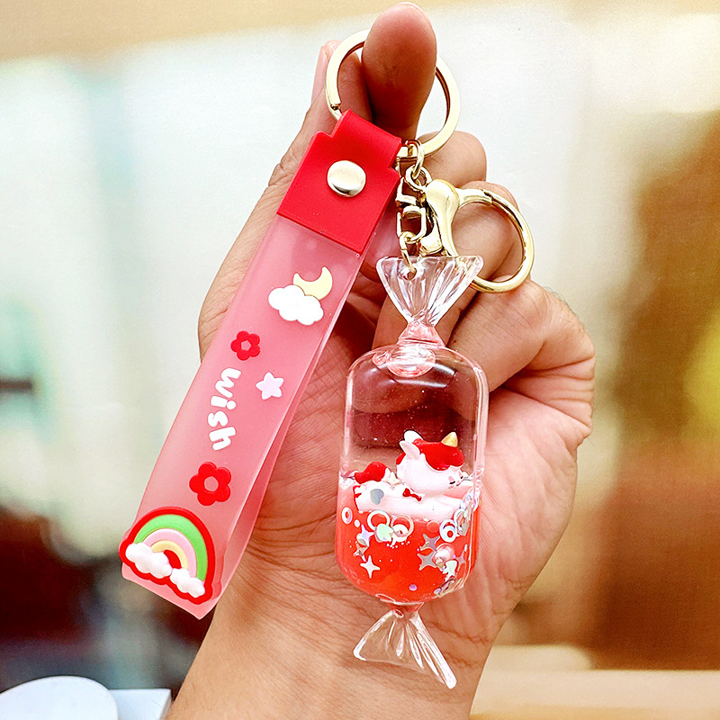 Púrpura estrella de cinco puntas líquido Quicksand llavero chica corazón flor de cerezo aceite colgante lindo tridimensional mochila adornos para mujeres