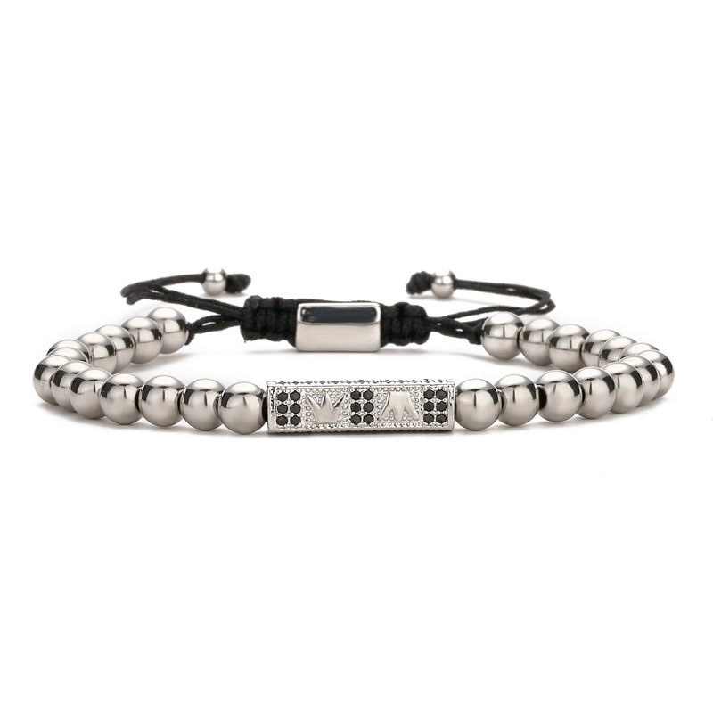 Europeo y americano nuevo encanto corona rectangular pulsera de los hombres negro denso con incrustaciones de circón tejido oro bola de acero pulsera Cruz
