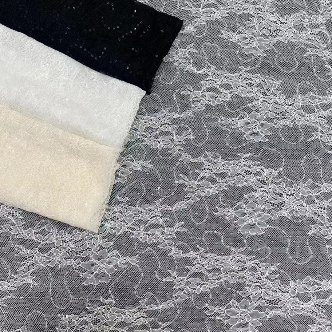 新款热卖~春夏闪亮款锦纶无弹薄透款大花位剪线蕾丝绣片 裙装面料