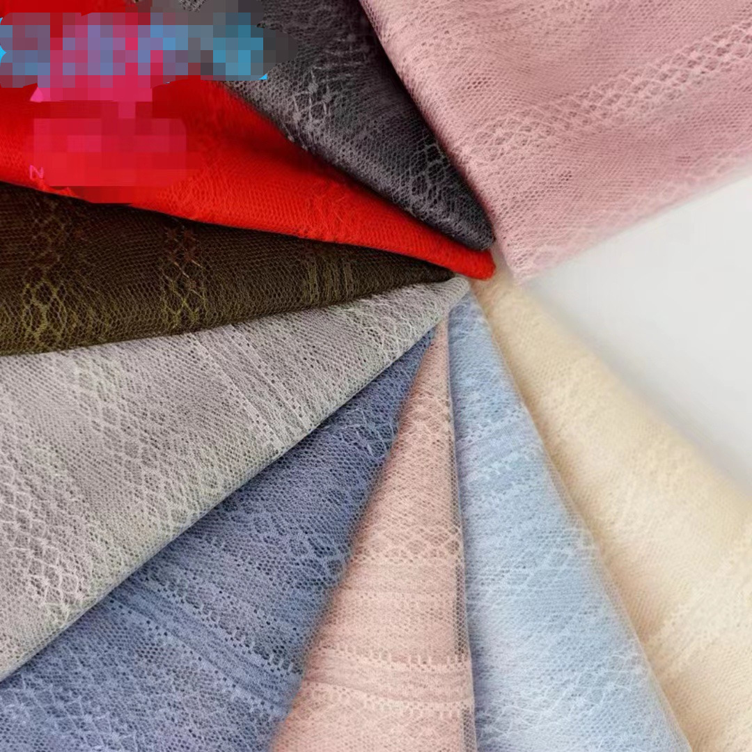 厂家直销~多色供应无弹轻盈透薄涤纶花纹竖条提花网布 裙装等面料