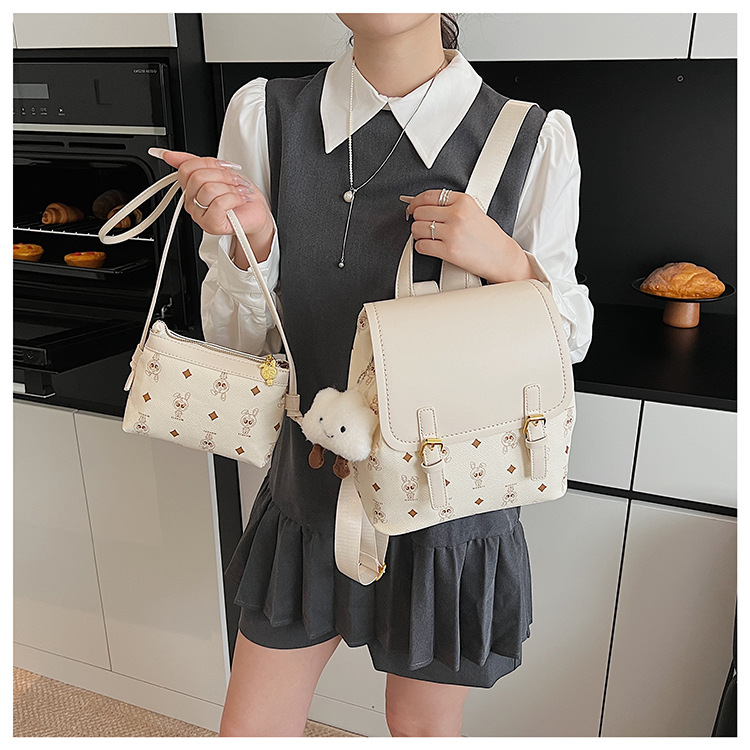 This is a niche design for women, featuring cartoon animal prints. It is a pink backpack with a high level of appearance and large capacity for travel undefined