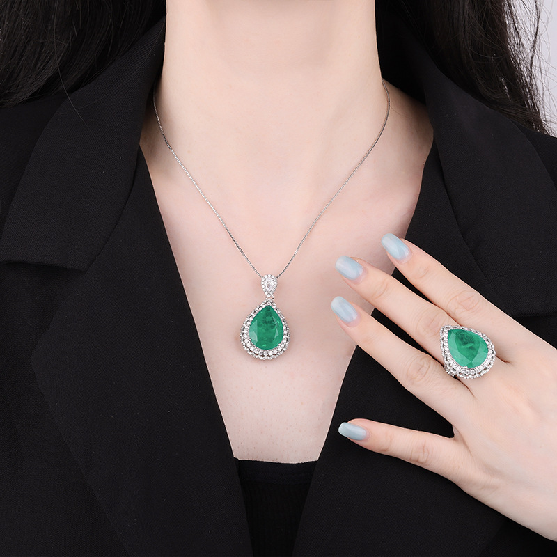 Zhuang Sheng joyas cobre Fondo chapado en oro europeo y americano traje simulación color tesoro gota de agua diamante-incrustado luz lujo temperamento traje 15*20