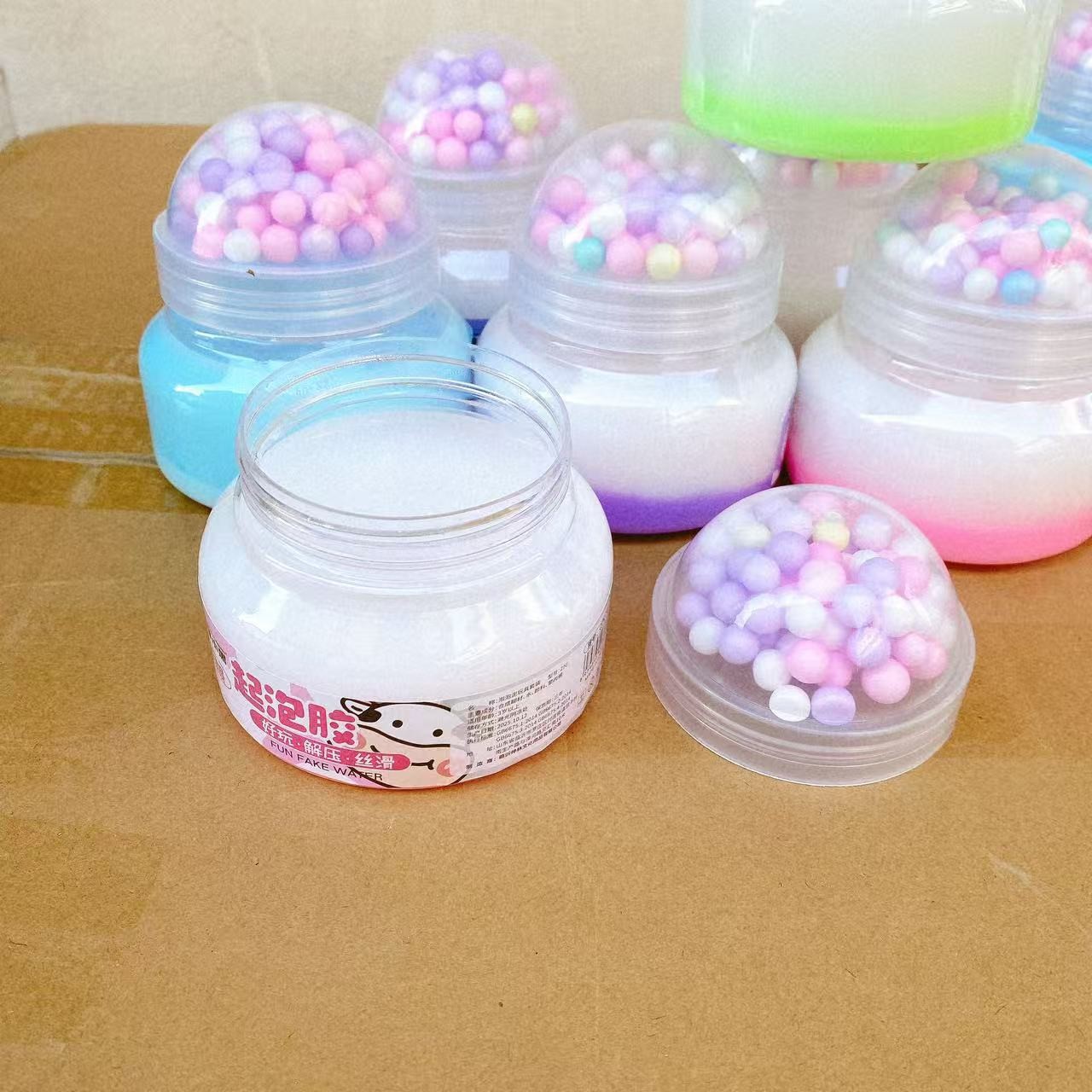 Juguetes de descompresión de dos colores cinta espumosa perlas de color puzzle slime barro de cristal barro de color alta permeabilidad al por mayor 2 yuanes