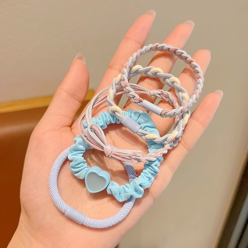 Banda de goma de color para niños niñas atadas cabello cuerda de cabello de alta elasticidad cuerda de cabello duradera de cabello de alta calidad anillo de cabello cubierta de cuero