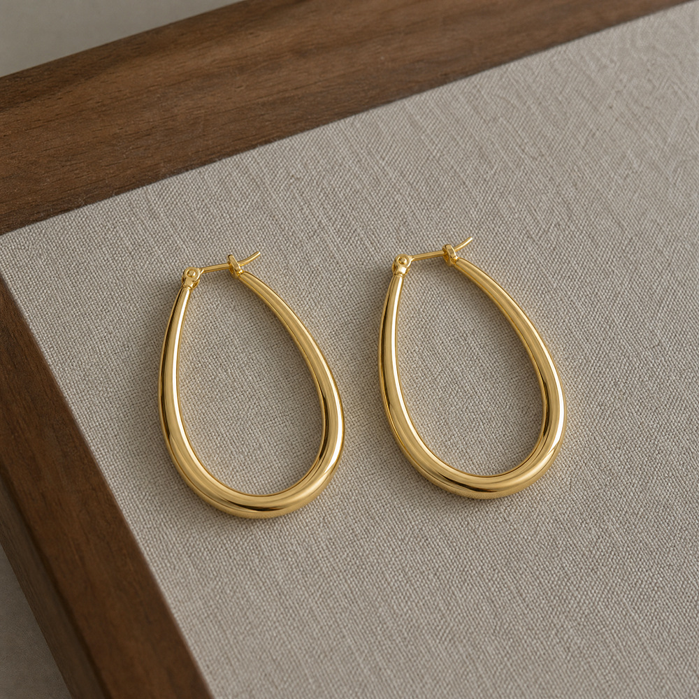 Copper-plated eco-friendly gold hollow hoop earrings, European and American minimalist water drop earrings, exaggerated high-end geometric earrings, cross-border