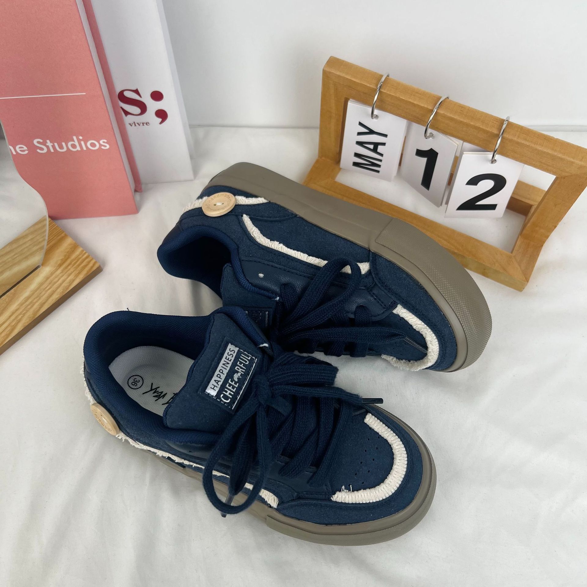 Zapatos de lona de borla versátil estilo coreano para mujeres 2024 primavera nuevo estudiante plano de moda estilo universitario japonés zapatos blancos para mujeres