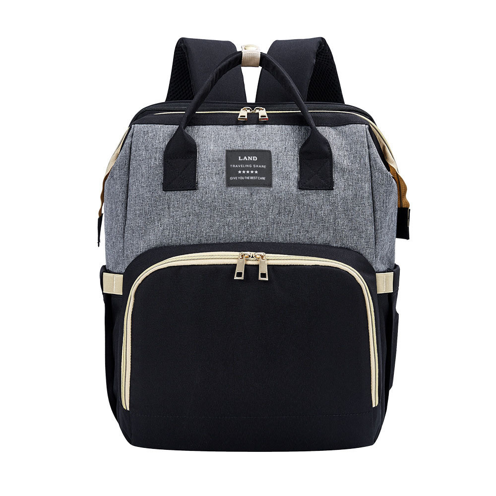 Japonés y coreano nuevo bolso de la momia mochila Oxford impermeable ultra-ligero de gran capacidad hacia fuera la madre y el bebé bolsa de leche para juguetes gratis