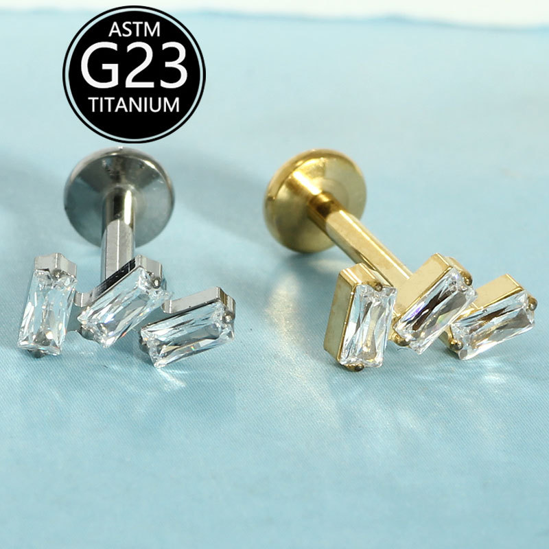 Silver pointed spike labret stud material detail