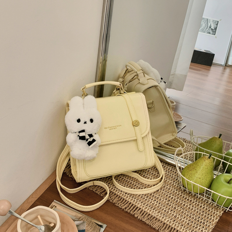 Cantos colgantes de dibujos animados de hombro pequeño bolso de mujer de verano estilo coreano nicho color sólido mochila mujer