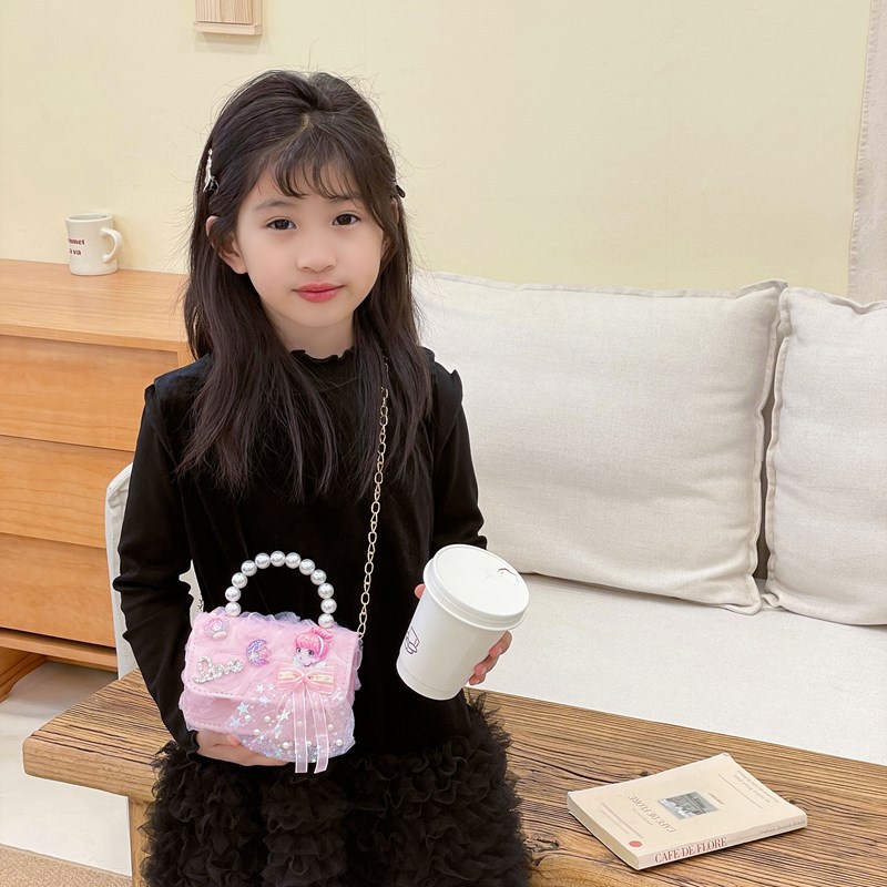 Dulce princesa bolso de hombro de perlas de aire extranjero bolso de mano para niños 2025 mini bolso de arco para niños