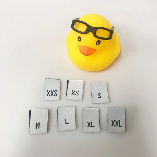 Label the XXS size clothing on the dress with BAL code number, hang tag, ready-to-wear letter code label, Baji collar label, size fabric tag.