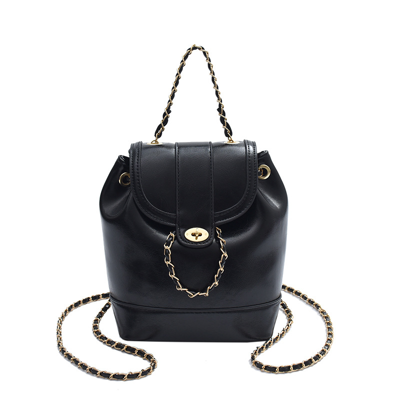 2024 nuevo estilo ins moda negro pequeña fragancia cadena mochila femenina estudiante