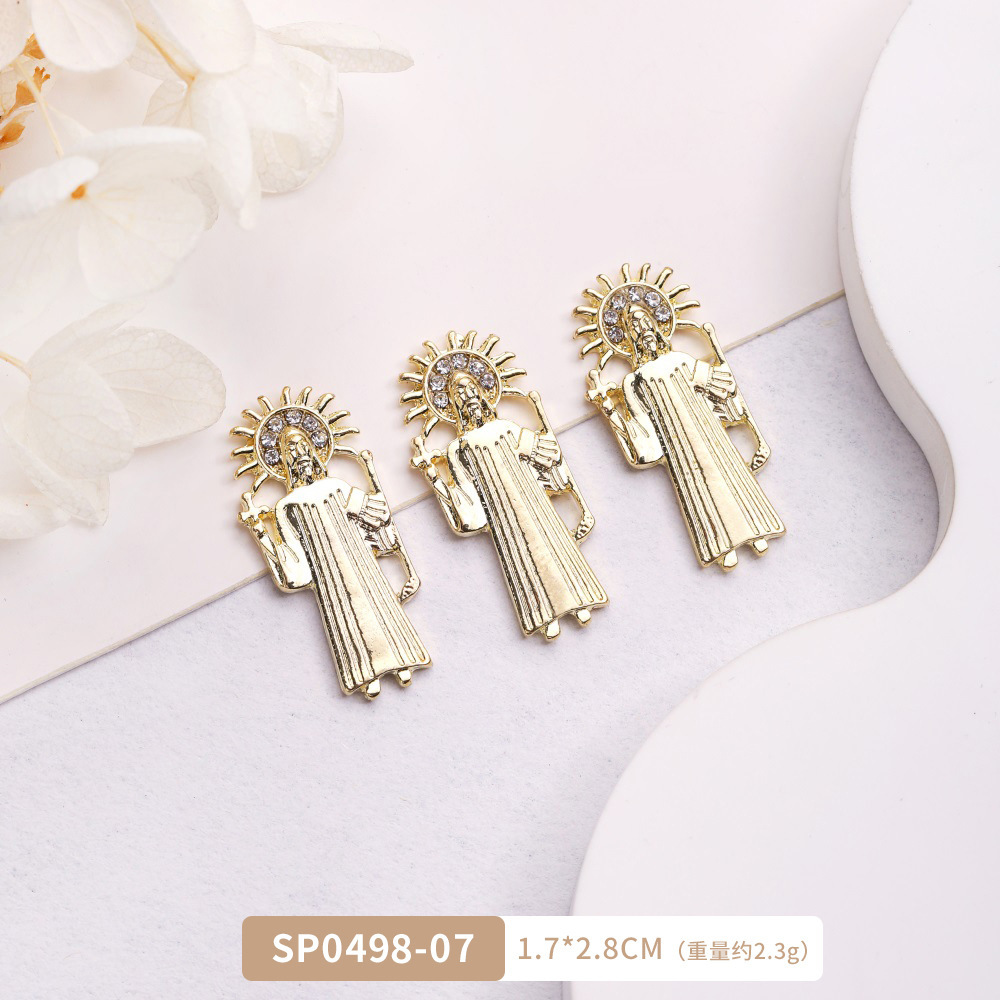 Arte de uñas transfronterizo Jesús accesorios de metal DIY vintage metal aleación uñas arte joyería europea y americana Luz de lujo accesorios con diamante