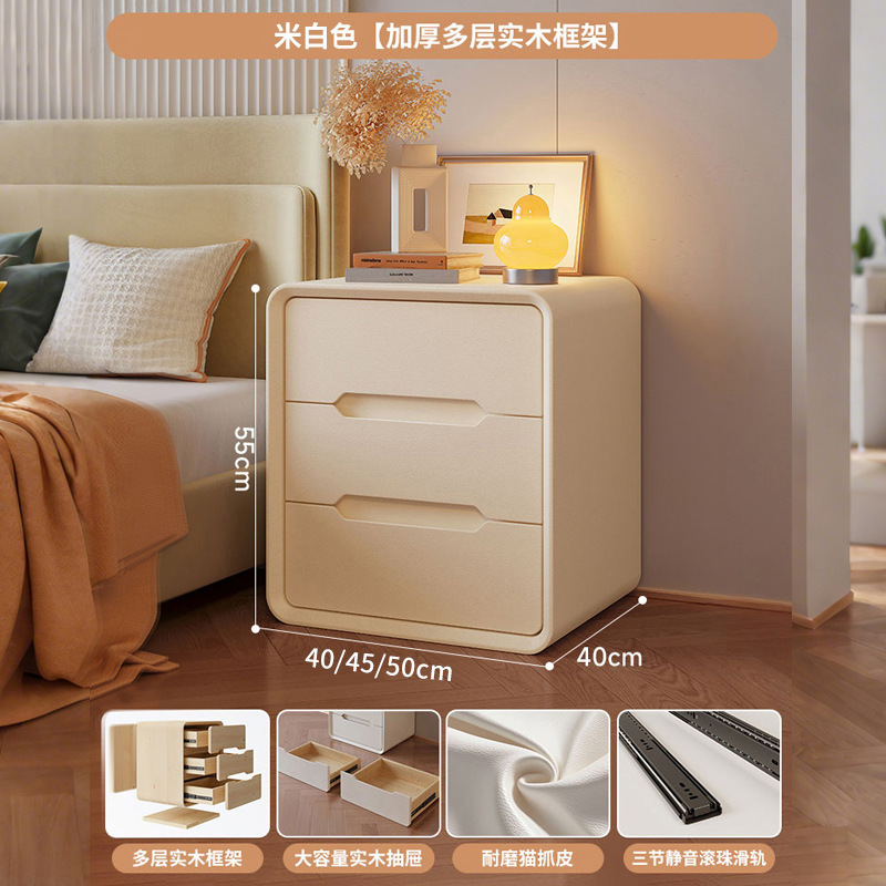 Mesa de cabezal de cama de madera maciza dormitorio doméstico 2025 nuevo estilo de cama pequeño viento de crema de lujo ligero alta sensación gabinete de almacenamiento