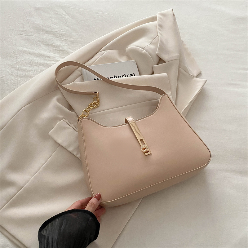 Bolso de alta sensación 2024, nuevo bolso de moda, primavera y verano, simple y versátil bolso de hombro de transporte, bolso de nicho de textura bajo la axila